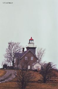 Lighthouse with the "skeletal" tower next to it.