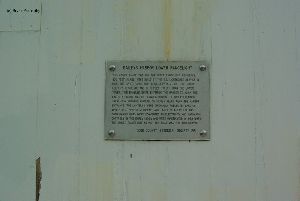 Sign on the side if the lighthouse.