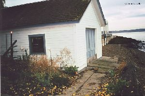 Boat house leading to the water.