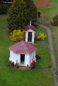 Looking down at the oil house and privy.