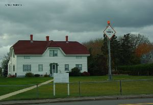 The keepers quarters and a danger light.