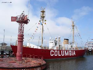 Lightship and buoy docked in Astoria.