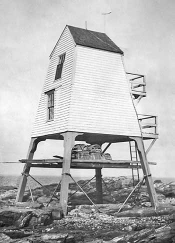 U.S. Coast Guard Archive Photo showing the raised oil house at Halfway Rock Lighthouse