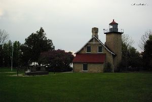 The lighthouse facing the bay.