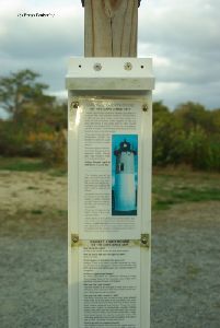 Sign by the tower.
