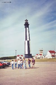 People congregate new the lighthouse.