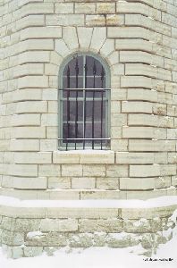 Ornate brickwork around the tower windows.