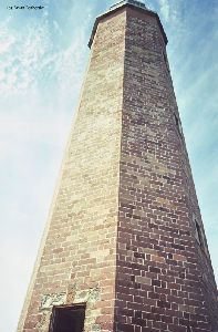 Looking up at Old Cape Henry.