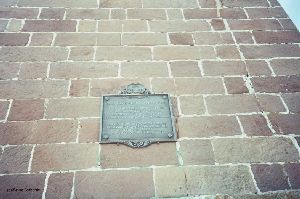 Plaque on the side of the tower.