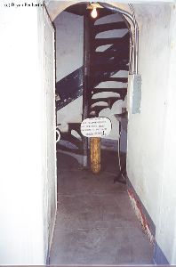 The hallway leading to the stairs.