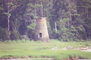 Shot of the lighthouse on shore.