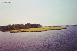 Lighthouse in distance.
