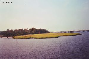 Lighthouse in distance.