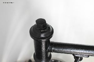 Bolt at the top of the stairs.
