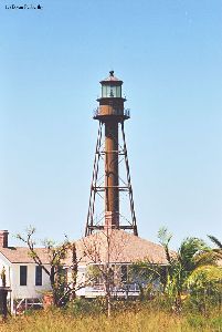 Sanibel Island Lighthouse towers over the cottage.