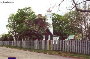 The lighthouse and keeper