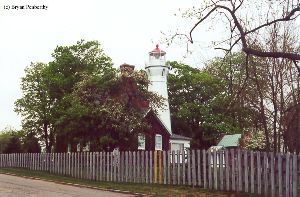 Shot of the lighthouse from the lake public access lot.