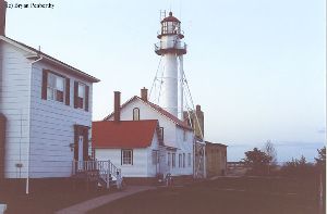 Several buildings and the lighthouse.